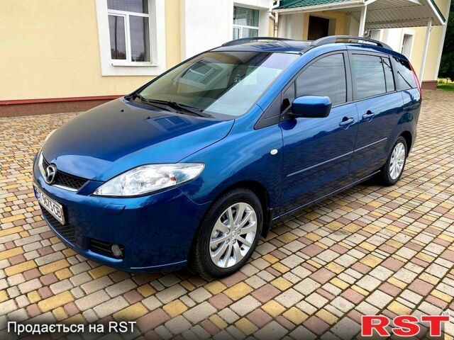 Синий Мазда 5, объемом двигателя 2 л и пробегом 200 тыс. км за 5500 $, фото 1 на Automoto.ua