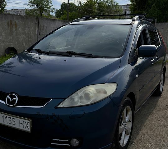 Синий Мазда 5, объемом двигателя 2 л и пробегом 470 тыс. км за 5000 $, фото 1 на Automoto.ua