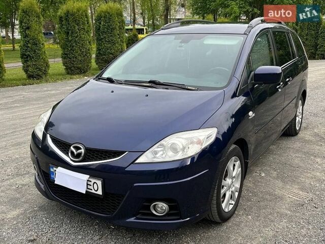 Синий Мазда 5, объемом двигателя 2 л и пробегом 248 тыс. км за 6800 $, фото 1 на Automoto.ua