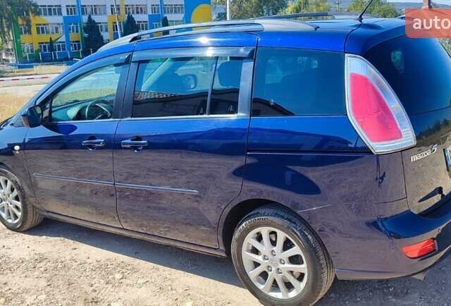 Синий Мазда 5, объемом двигателя 1.8 л и пробегом 220 тыс. км за 5700 $, фото 1 на Automoto.ua