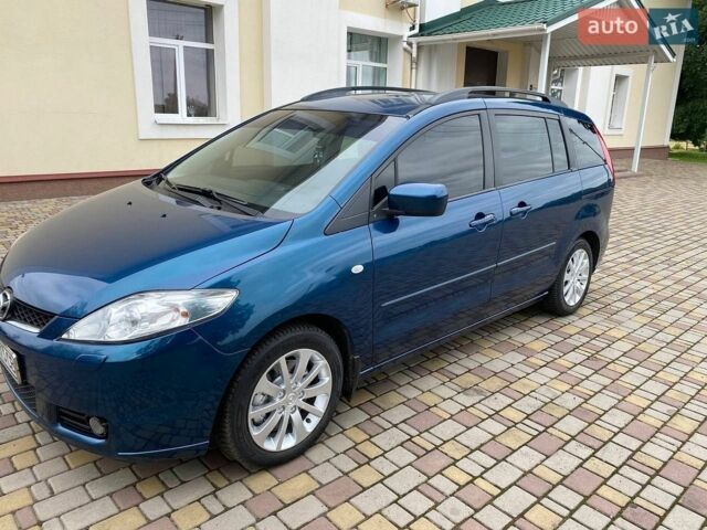 Синий Мазда 5, объемом двигателя 2 л и пробегом 200 тыс. км за 5500 $, фото 1 на Automoto.ua