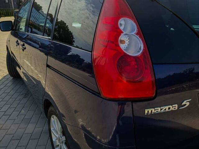 Синий Мазда 5, объемом двигателя 2 л и пробегом 285 тыс. км за 4014 $, фото 1 на Automoto.ua