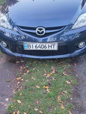 Синий Мазда 5, объемом двигателя 2 л и пробегом 322 тыс. км за 5700 $, фото 1 на Automoto.ua