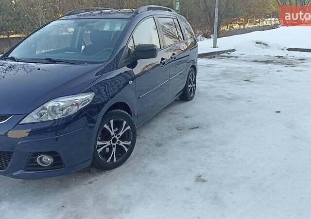 Синий Мазда 5, объемом двигателя 2 л и пробегом 337 тыс. км за 4900 $, фото 1 на Automoto.ua