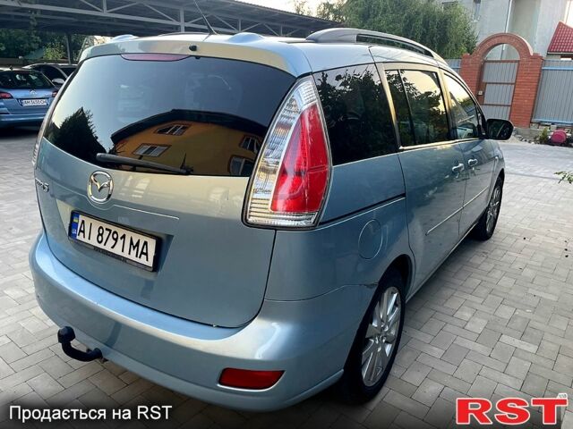 Синий Мазда 5, объемом двигателя 2 л и пробегом 243 тыс. км за 5200 $, фото 1 на Automoto.ua