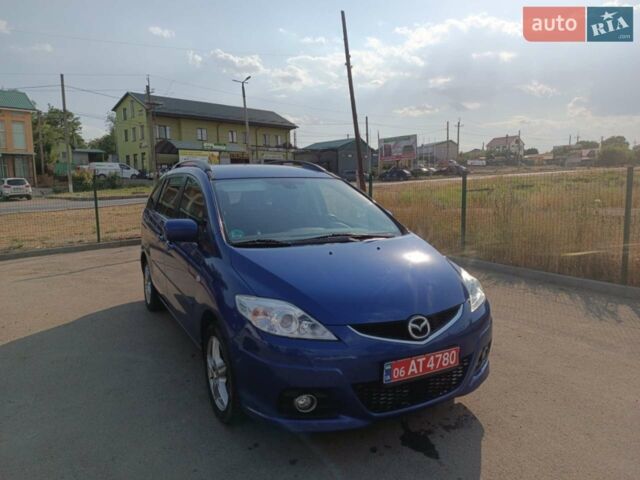 Синий Мазда 5, объемом двигателя 1.8 л и пробегом 242 тыс. км за 5600 $, фото 1 на Automoto.ua