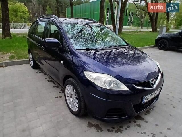 Синий Мазда 5, объемом двигателя 2 л и пробегом 257 тыс. км за 4750 $, фото 1 на Automoto.ua