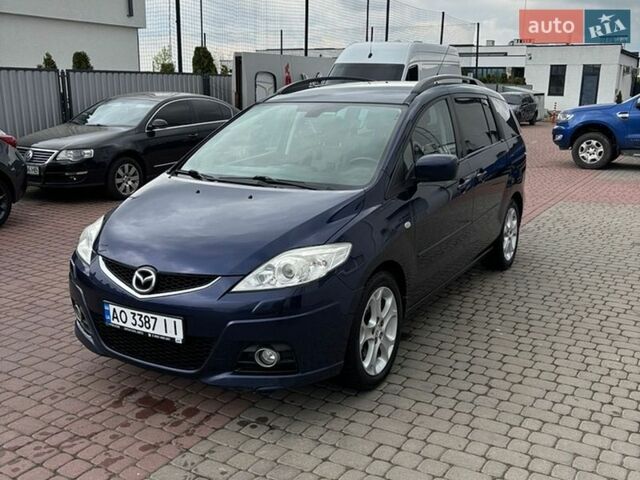 Синий Мазда 5, объемом двигателя 2 л и пробегом 239 тыс. км за 6500 $, фото 1 на Automoto.ua