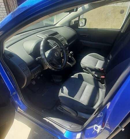 Синий Мазда 5, объемом двигателя 2 л и пробегом 287 тыс. км за 5950 $, фото 1 на Automoto.ua