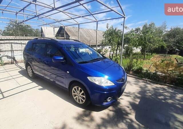 Синий Мазда 5, объемом двигателя 2 л и пробегом 300 тыс. км за 5900 $, фото 1 на Automoto.ua