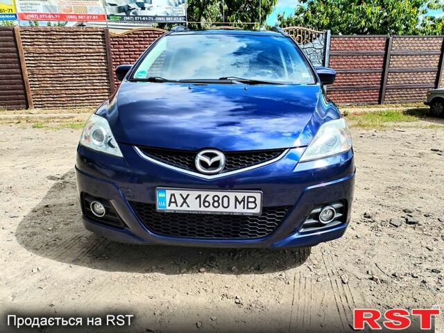 Синий Мазда 5, объемом двигателя 1.8 л и пробегом 211 тыс. км за 6500 $, фото 1 на Automoto.ua