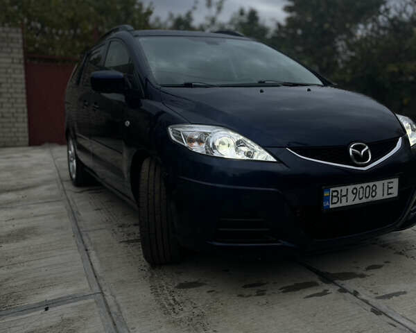 Синий Мазда 5, объемом двигателя 2 л и пробегом 363 тыс. км за 6100 $, фото 1 на Automoto.ua