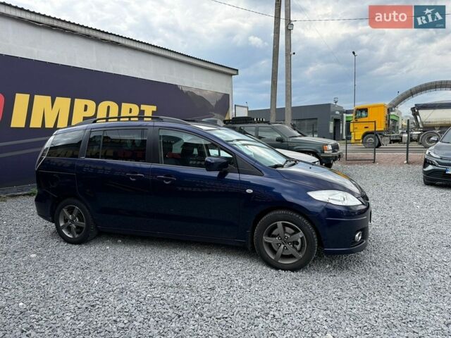 Синий Мазда 5, объемом двигателя 2 л и пробегом 244 тыс. км за 6800 $, фото 1 на Automoto.ua