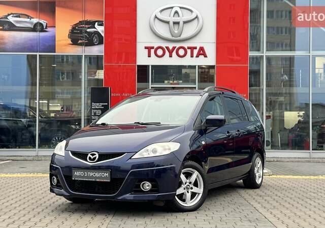 Синий Мазда 5, объемом двигателя 2 л и пробегом 210 тыс. км за 6700 $, фото 1 на Automoto.ua