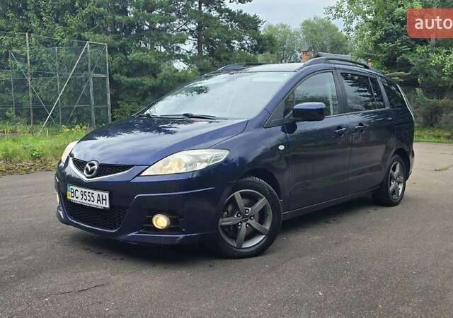 Синий Мазда 5, объемом двигателя 2 л и пробегом 240 тыс. км за 6300 $, фото 1 на Automoto.ua