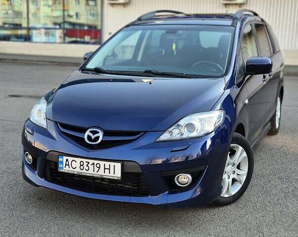 Синий Мазда 5, объемом двигателя 2 л и пробегом 278 тыс. км за 7000 $, фото 1 на Automoto.ua