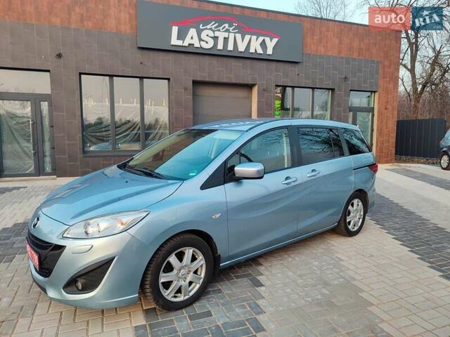 Синий Мазда 5, объемом двигателя 2 л и пробегом 162 тыс. км за 7550 $, фото 1 на Automoto.ua