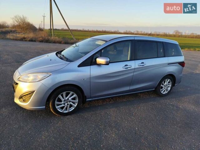 Синий Мазда 5, объемом двигателя 1.8 л и пробегом 98 тыс. км за 9000 $, фото 1 на Automoto.ua