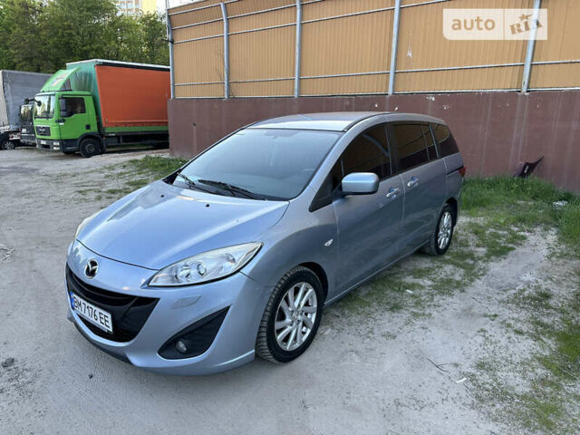 Синий Мазда 5, объемом двигателя 2 л и пробегом 154 тыс. км за 7300 $, фото 1 на Automoto.ua