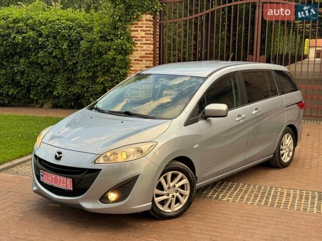 Синий Мазда 5, объемом двигателя 1.8 л и пробегом 99 тыс. км за 6650 $, фото 1 на Automoto.ua