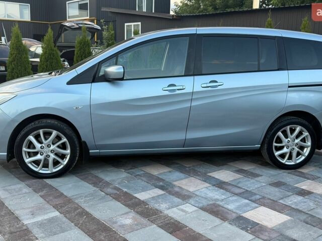 Синій Мазда 5, об'ємом двигуна 2 л та пробігом 217 тис. км за 7500 $, фото 1 на Automoto.ua