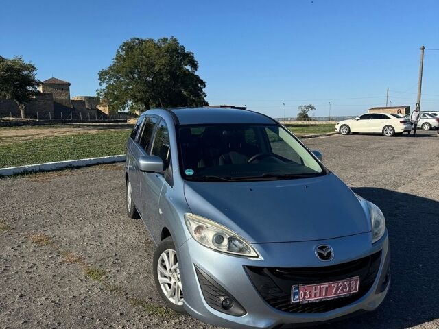 Синий Мазда 5, объемом двигателя 1.8 л и пробегом 99 тыс. км за 6500 $, фото 1 на Automoto.ua