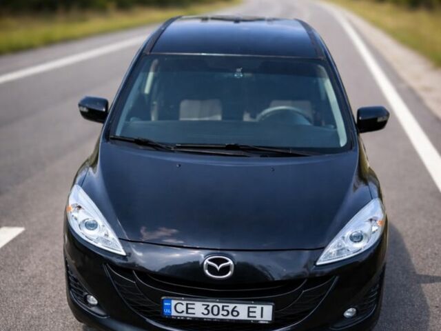 Синий Мазда 5, объемом двигателя 2.5 л и пробегом 221 тыс. км за 8700 $, фото 1 на Automoto.ua