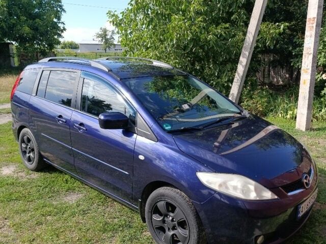 Синій Мазда 5, об'ємом двигуна 2 л та пробігом 227 тис. км за 6107 $, фото 1 на Automoto.ua