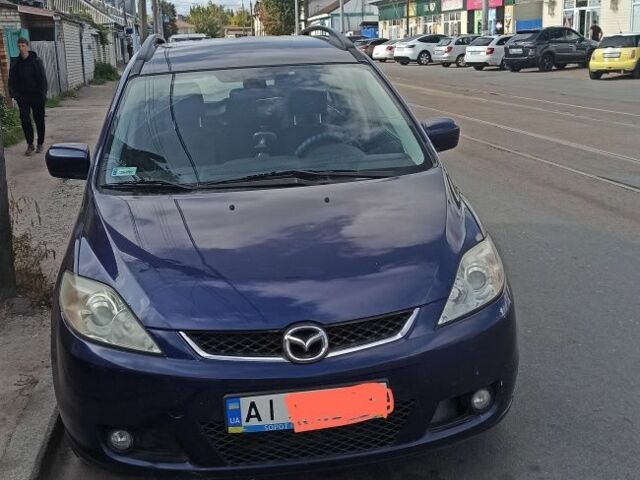 Синий Мазда 5, объемом двигателя 0 л и пробегом 300 тыс. км за 5000 $, фото 1 на Automoto.ua