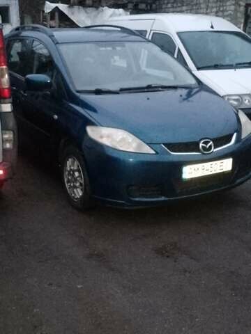 Зеленый Мазда 5, объемом двигателя 1.8 л и пробегом 118 тыс. км за 4888 $, фото 1 на Automoto.ua