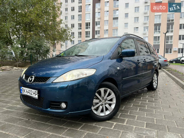 Зеленый Мазда 5, объемом двигателя 2 л и пробегом 243 тыс. км за 5350 $, фото 1 на Automoto.ua