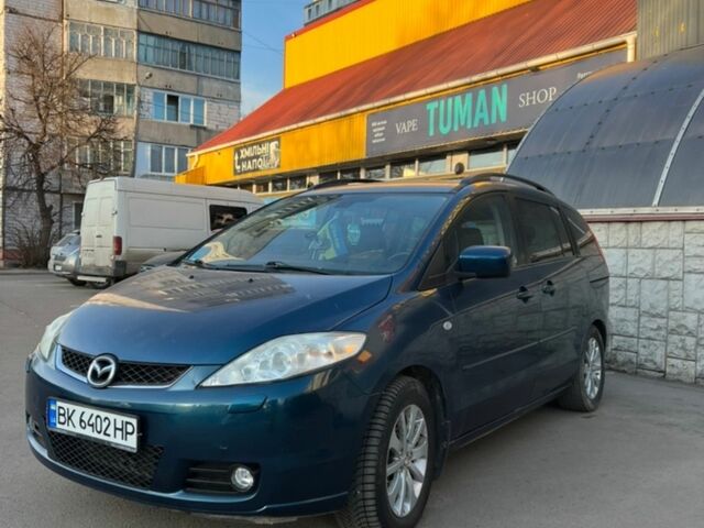 Зелений Мазда 5, об'ємом двигуна 2 л та пробігом 245 тис. км за 4400 $, фото 1 на Automoto.ua