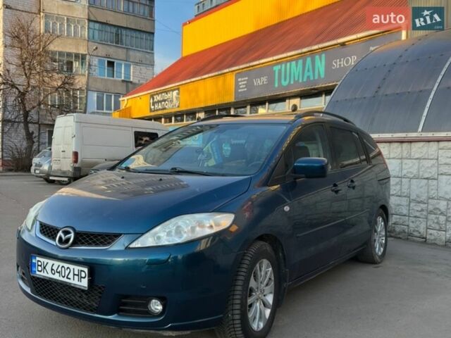 Зелений Мазда 5, об'ємом двигуна 2 л та пробігом 245 тис. км за 4700 $, фото 1 на Automoto.ua