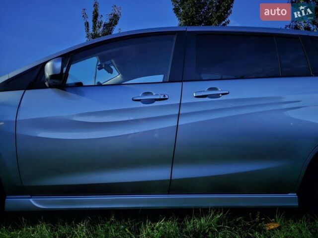 Зелений Мазда 5, об'ємом двигуна 1.6 л та пробігом 186 тис. км за 7000 $, фото 1 на Automoto.ua