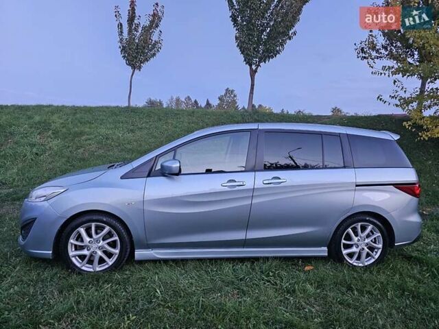 Зеленый Мазда 5, объемом двигателя 1.6 л и пробегом 186 тыс. км за 8000 $, фото 1 на Automoto.ua