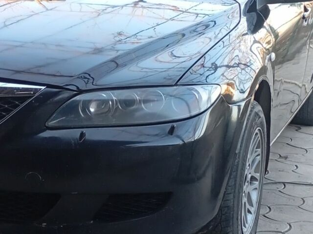 Чорний Мазда 6 МПС, об'ємом двигуна 1.8 л та пробігом 2 тис. км за 2000 $, фото 1 на Automoto.ua