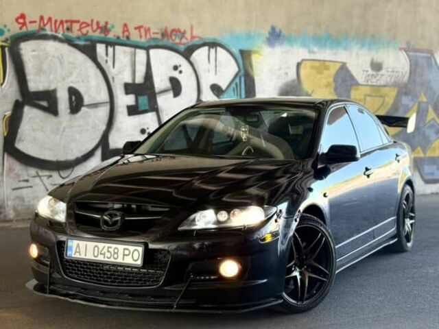Черный Мазда 6 МПС, объемом двигателя 2.3 л и пробегом 205 тыс. км за 7400 $, фото 1 на Automoto.ua
