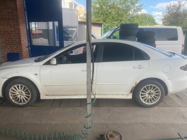 Білий Мазда 6, об'ємом двигуна 1.8 л та пробігом 250 тис. км за 1808 $, фото 1 на Automoto.ua