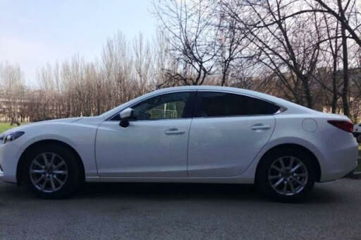 Білий Мазда 6, об'ємом двигуна 2.5 л та пробігом 105 тис. км за 9800 $, фото 1 на Automoto.ua