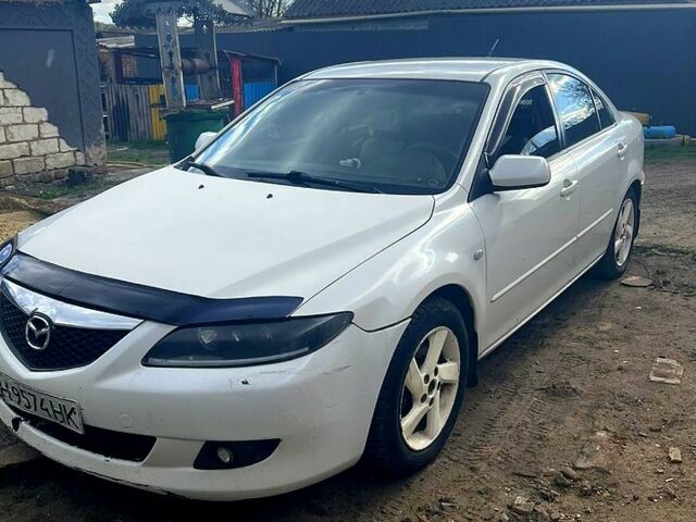 Белый Мазда 6, объемом двигателя 2 л и пробегом 208 тыс. км за 3800 $, фото 1 на Automoto.ua