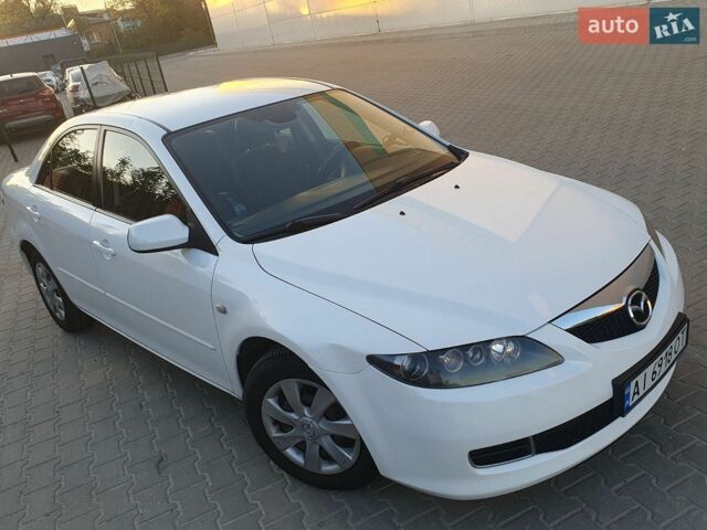 Белый Мазда 6, объемом двигателя 2 л и пробегом 189 тыс. км за 6700 $, фото 1 на Automoto.ua