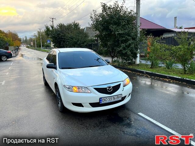 Білий Мазда 6, об'ємом двигуна 2 л та пробігом 200 тис. км за 3500 $, фото 1 на Automoto.ua