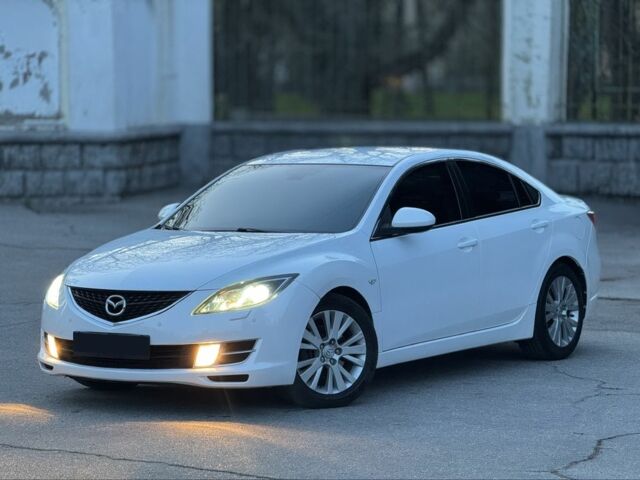 Белый Мазда 6, объемом двигателя 2 л и пробегом 210 тыс. км за 7200 $, фото 1 на Automoto.ua
