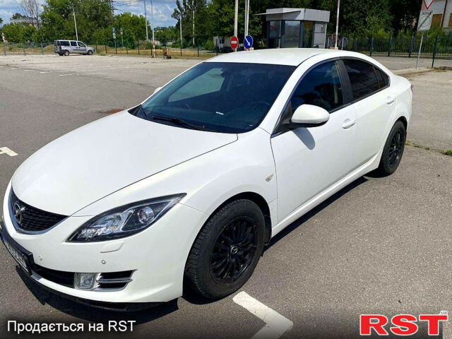 Белый Мазда 6, объемом двигателя 2 л и пробегом 189 тыс. км за 7500 $, фото 1 на Automoto.ua