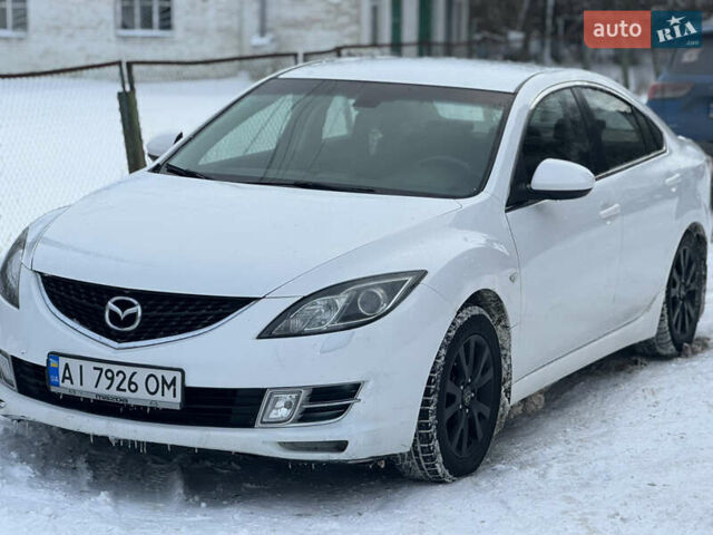 Белый Мазда 6, объемом двигателя 2 л и пробегом 244 тыс. км за 6600 $, фото 1 на Automoto.ua