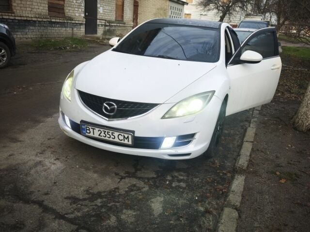 Белый Мазда 6, объемом двигателя 2 л и пробегом 195 тыс. км за 8300 $, фото 1 на Automoto.ua