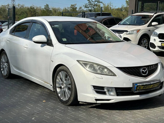 Белый Мазда 6, объемом двигателя 2 л и пробегом 235 тыс. км за 6700 $, фото 1 на Automoto.ua