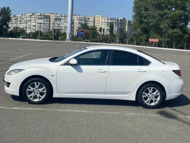 Белый Мазда 6, объемом двигателя 1.8 л и пробегом 207 тыс. км за 5900 $, фото 1 на Automoto.ua