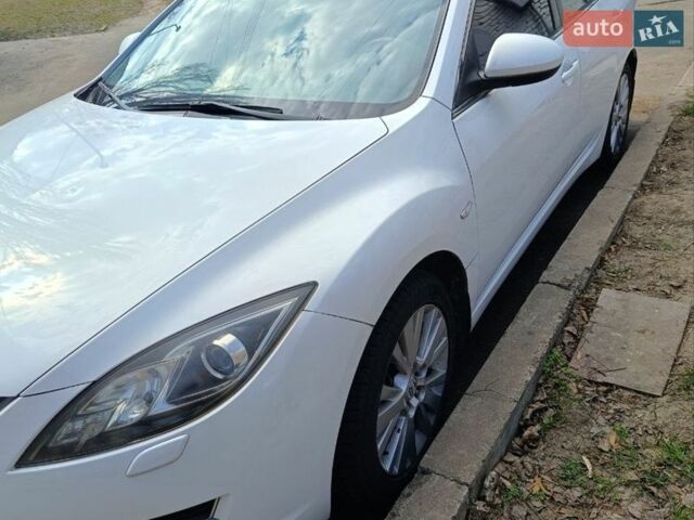 Белый Мазда 6, объемом двигателя 1.8 л и пробегом 98 тыс. км за 7500 $, фото 1 на Automoto.ua