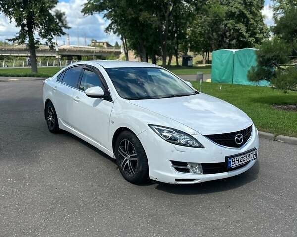 Белый Мазда 6, объемом двигателя 2 л и пробегом 150 тыс. км за 7700 $, фото 1 на Automoto.ua